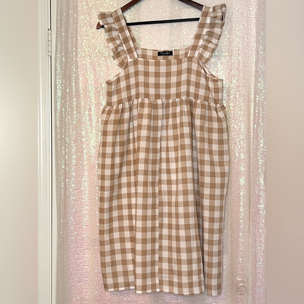 Pinafore style dress with empire waist.